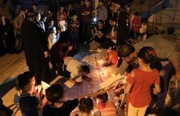The Children of Gaza Light Candles on the International Peace Day at Press House 