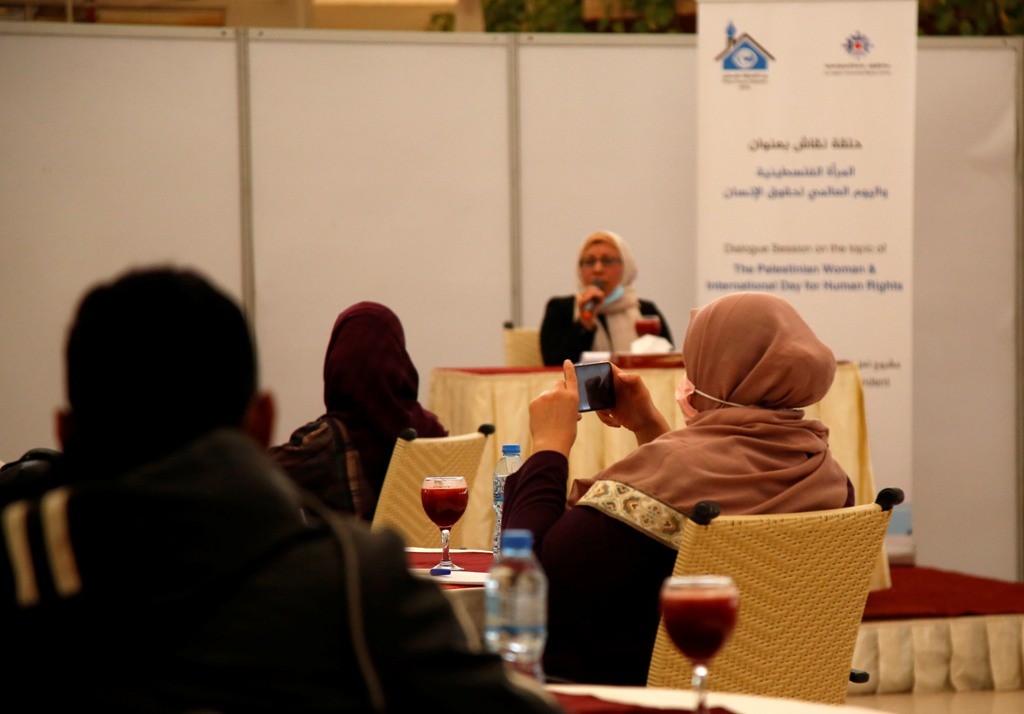  Dialogue session on the topic of "The Palestinian Women and International Day for Human Rights"