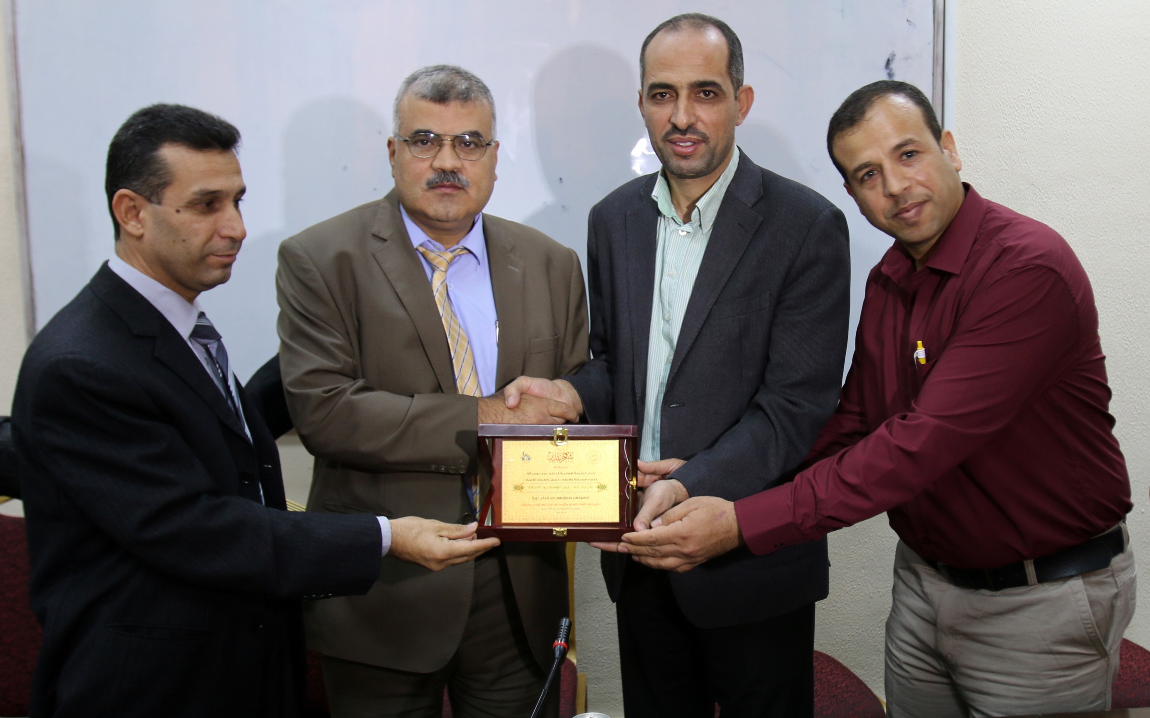 Head of Islamic University of Gaza Honors Press House - Palestine