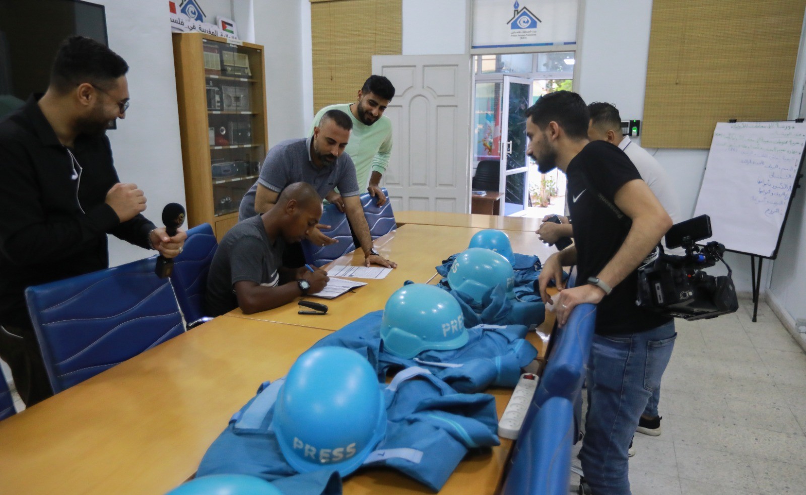 Press House distributes  safety equipment to dozens of journalists for media coverage during the war